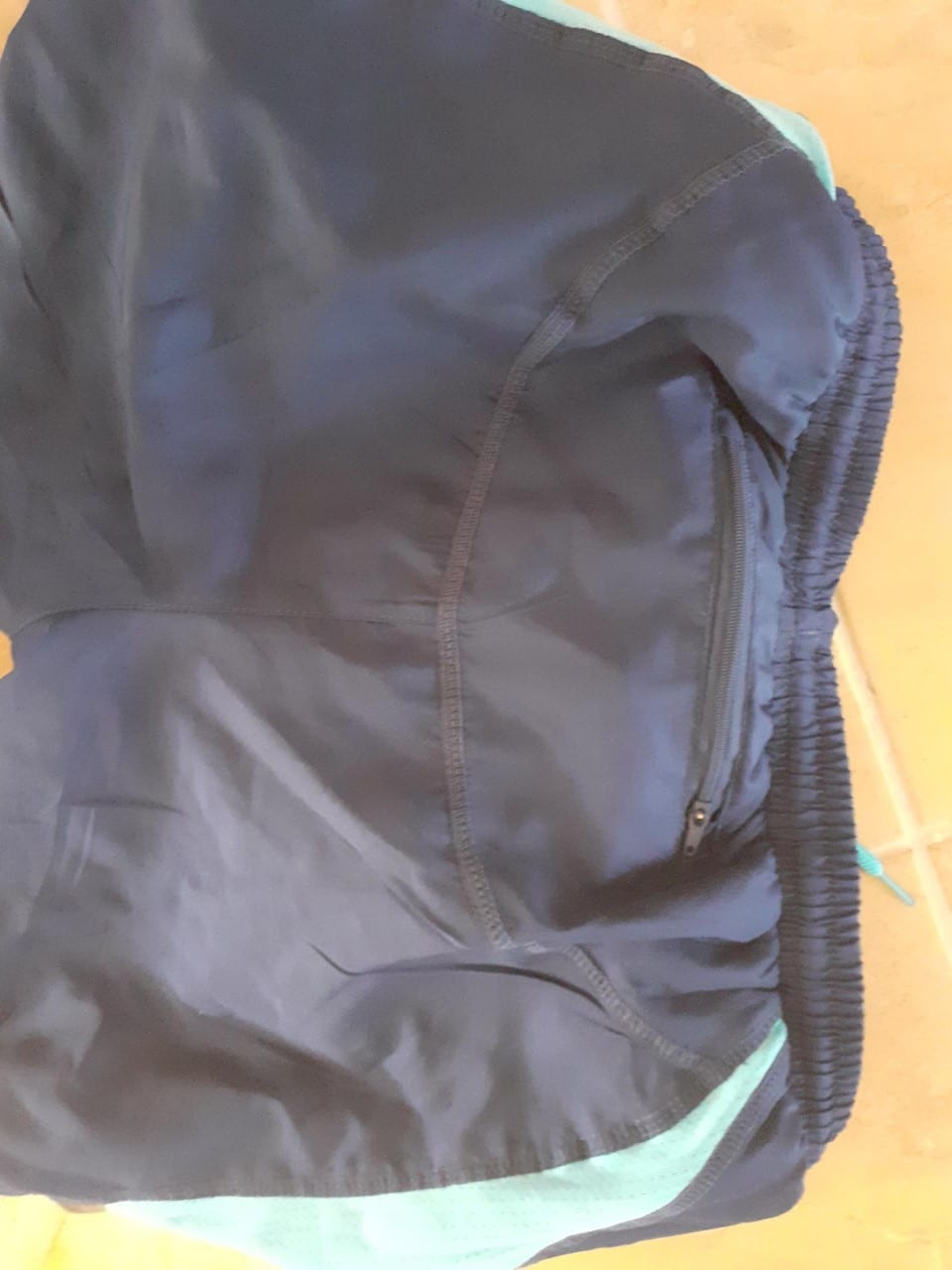 What Are The Little Pockets In Running Shorts For? - Great Running Advice